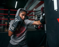 variant:Grey/Black::TITLE Boxing Gel Glory Super Bag Gloves 2.0 girl striking bag