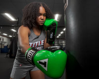 variant:Lime/Black::TITLE Boxing Gel Glory Super Bag Gloves 2.0 girl striking bag