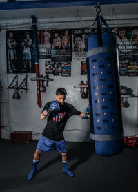 variant:150 lbs::TITLE Boxing Greatest Heavy Bag Ever guy hitting bag
