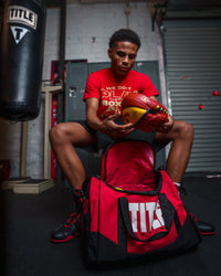 variant:red::TITLE Boxing Individual Sport Bag pulling out mitts out of bag