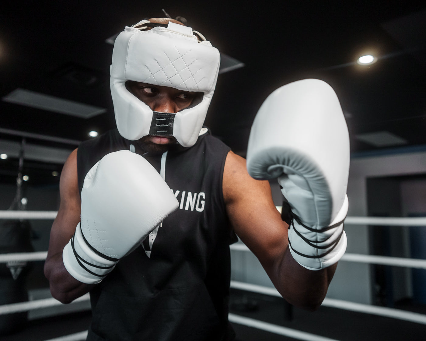 variant:White::TITLE Boxing Ko-Vert Headgear  man posing in headgear