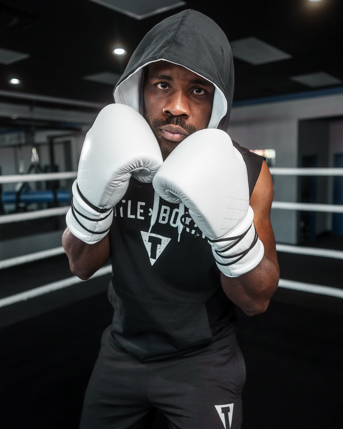 variant:White::TITLE Boxing Ko-Vert Sparring Gloves man posing in gloves