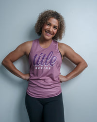 variant:purple::TITLE Boxing Script Racerback Women's Tank woman posing in tank top