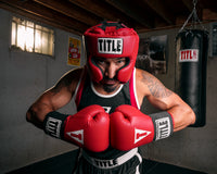 variant:red::TITLE Boxing USA Boxing Masters Competition Headgear guy hands together