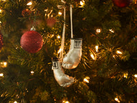 variant:shiny gold::TITLE Boxing 3.5” Mini Boxing Gloves hanging on Xmas tree