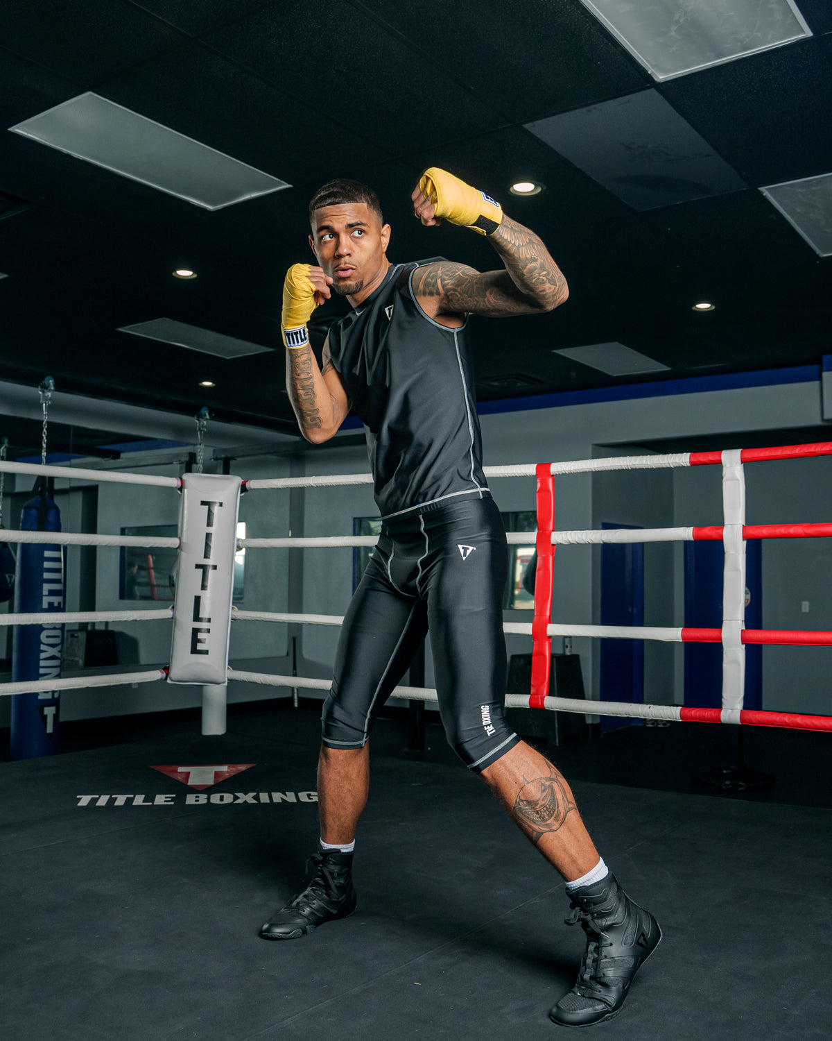 variant:Gold::TITLE Boxing Mexican Style 180" Hand Wraps guy posing with hands wrapped in hand wraps