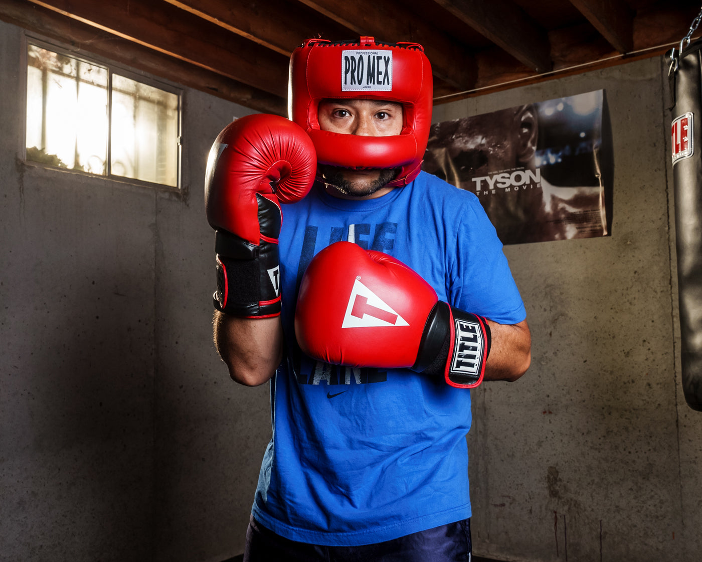 variant:Red::Pro Mex Pro Facesaver Headgear 3 man posing in headgear