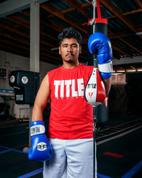 variant:Blue::Pro Mex Professional Bag Gloves V3.0 man in gym wearing gloves