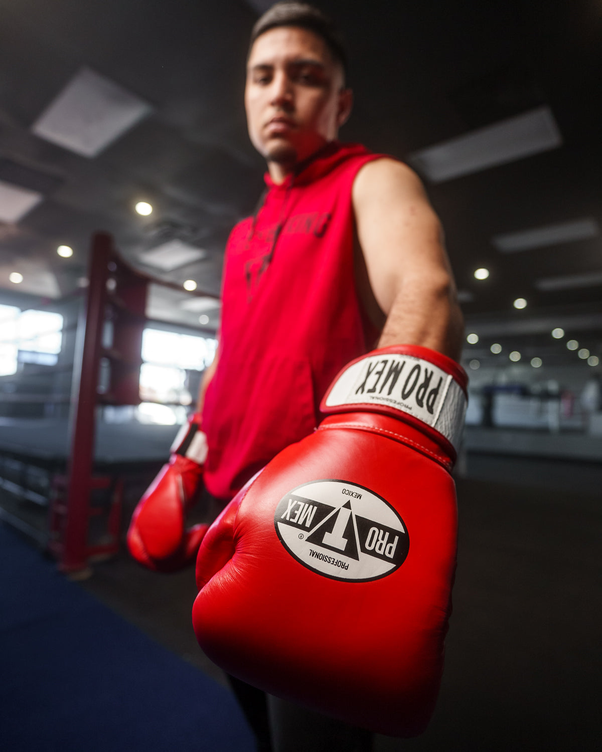 variant:Red::Pro Mex Professional Bag Gloves V3.0 man showing glove