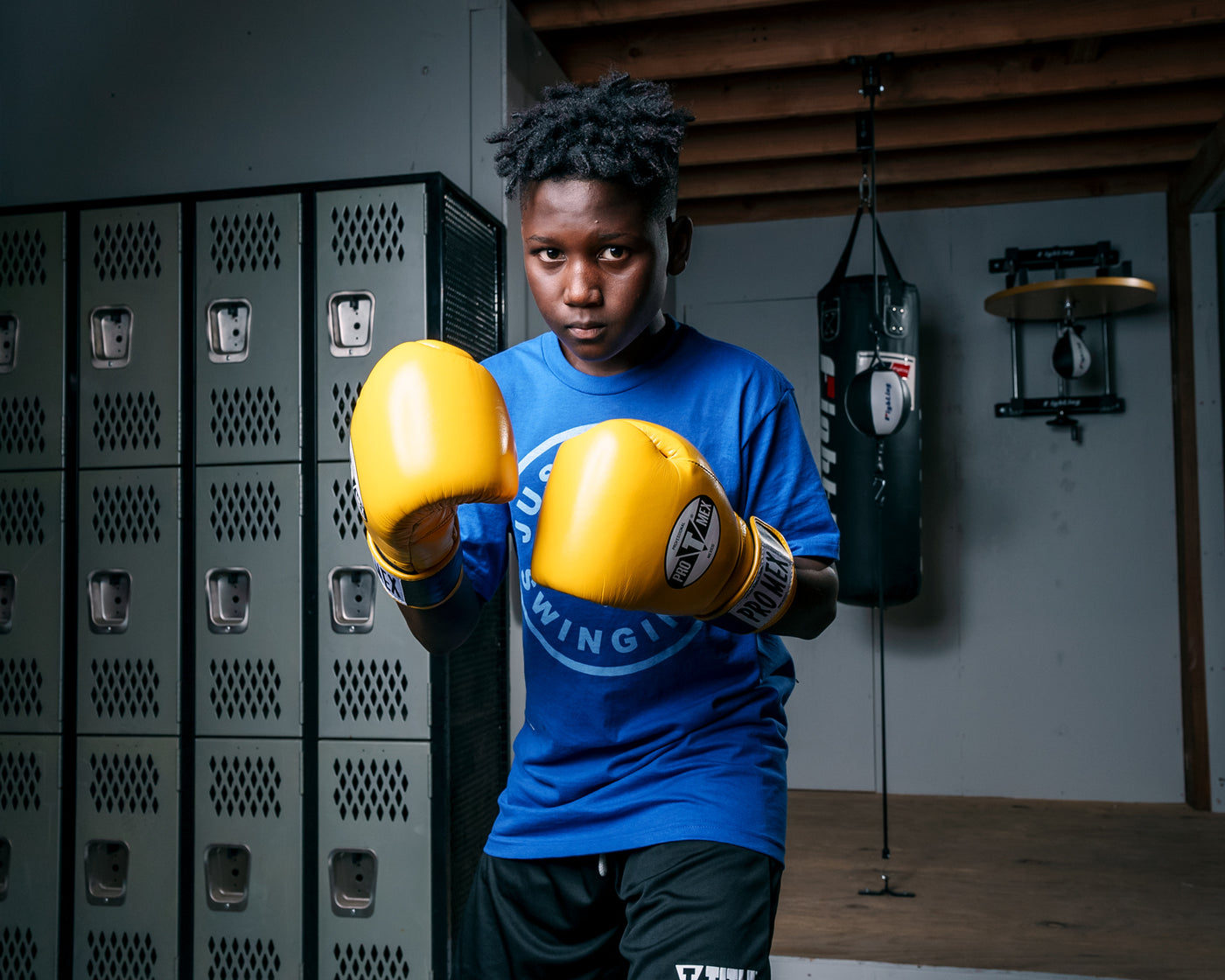 variant:Yellow::Pro Mex Professional Bag Gloves V3.0 boy wearing gloves