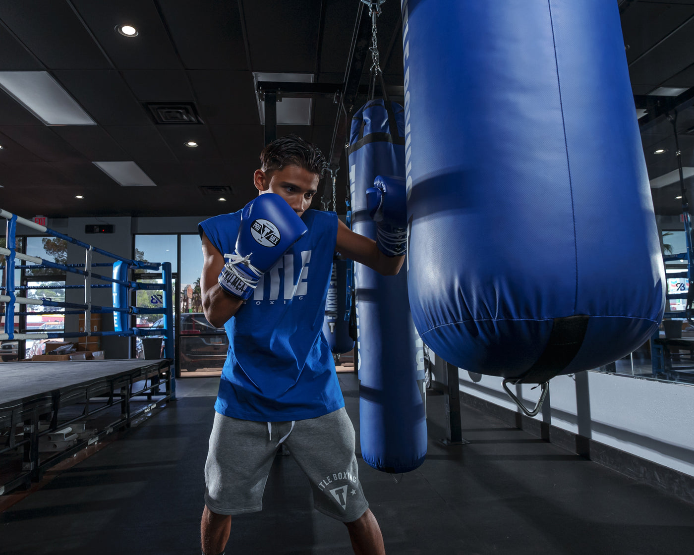 variant:Blue/White::Pro Mex Professional Lace Sparring Gloves V3.0 kid hitting bag