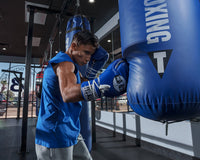 variant:Blue/White::Pro Mex Professional Lace Sparring Gloves V3.0 kid hitting bag right jab