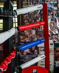 variant:RD/WH/BL::TITLE Boxing Ring Turnbuckle Covers cover on ring 