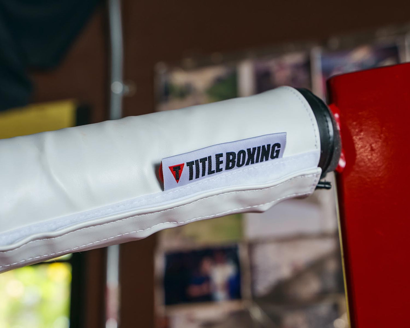 variant:RD/WH/BL::TITLE Boxing Ring Turnbuckle Covers cover on ring closeup white