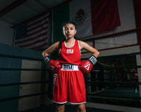 variant:lifestyle::TITLE Boxing Aerovent Elite Amateur Boxing Set 1 2.0 girl posing in red side