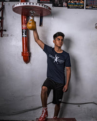 variant:5" x 8"::TITLE Boxing Super Speed Bags guy posing next to speed bag