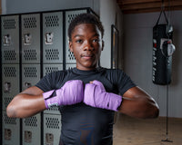 variant:light purple::TITLE Boxing Select 180" Semi Elastic Mexican Hand Wraps boy with hands together