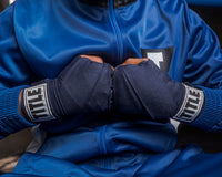 variant:navy::TITLE Boxing Select 180" Semi Elastic Mexican Hand Wraps hands together