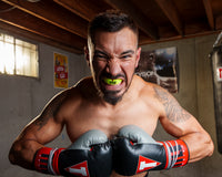 variant:yellow::TITLE Boxing Super Shield X2 Mouth Guard guy wearing mouth guard