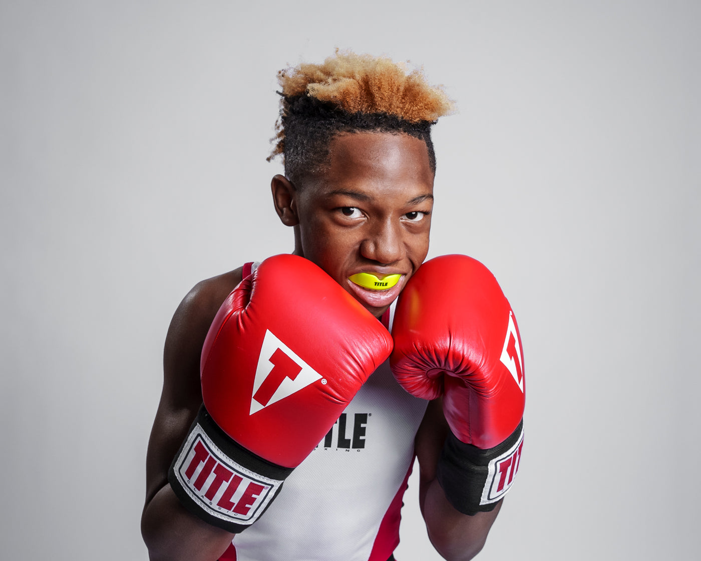 variant:yellow::TITLE Boxing Super Shield X2 Mouth Guard guy wearing mouth guard