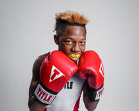 variant:yellow::TITLE Boxing Super Shield X2 Mouth Guard guy wearing mouth guard