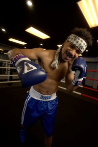 variant:black/clear::TITLE Air Force Duo-Defense Mouth Guard 2.0 kid boxing pose