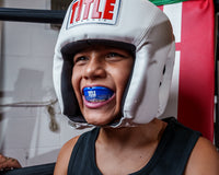variant:blue/blue::TITLE Air Force Duo-Defense Mouth Guard 2.0 close up of mouthguard in mouth 