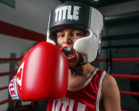 variant:black/red::TITLE Air Force Duo-Defense Youth Mouth Guard 2.0  kid putting in mouth