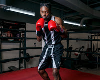variant:black/white::TITLE Boxing Momentum Amateur Boxing Set guy boxing stance