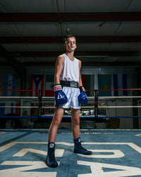 variant:white::TITLE Boxing Aerovent Elite Racerback Boxing Jersey 2.0 kid in ring