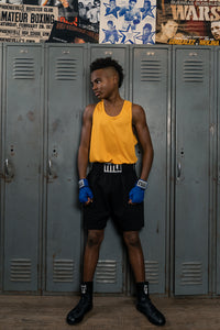 variant:Black::TITLE Boxing Speed-Flex Encore Mid-Top Shoes boy modeling shoes