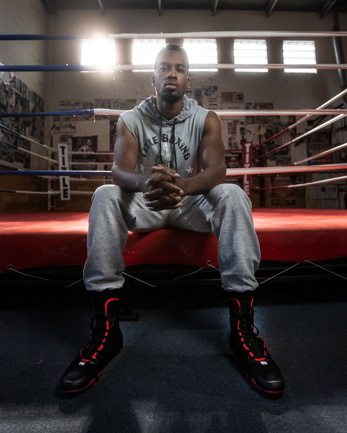 variant:Black/Red::TITLE Boxing Total Balance Shoes man sitting in ring