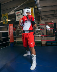 variant:White::TITLE Boxing Speed-Flex Encore Mid-Top Shoes man posing in shoes