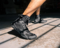 variant:black::TITLE Charged Boxing Shoes pictures of just shoes 