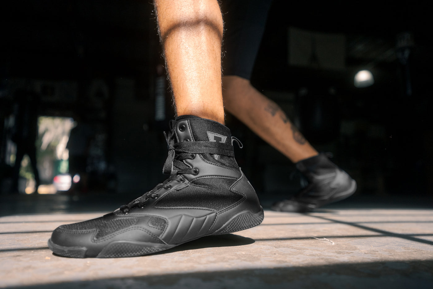 variant:black::TITLE Charged Boxing Shoes up close of black shoe