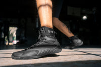 variant:black::TITLE Charged Boxing Shoes up close of black shoe