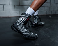variant:Black/White::TITLE Boxing Predator Shoes 2.0 side view close up