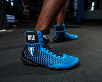 variant:black/blue::TITLE Predator II Boxing Shoes guy in shoes