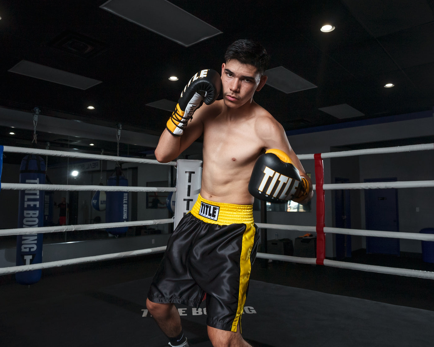 variant:black/gold::TITLE Boxing Edge Boxing Trunks 2.0 guy in ring club