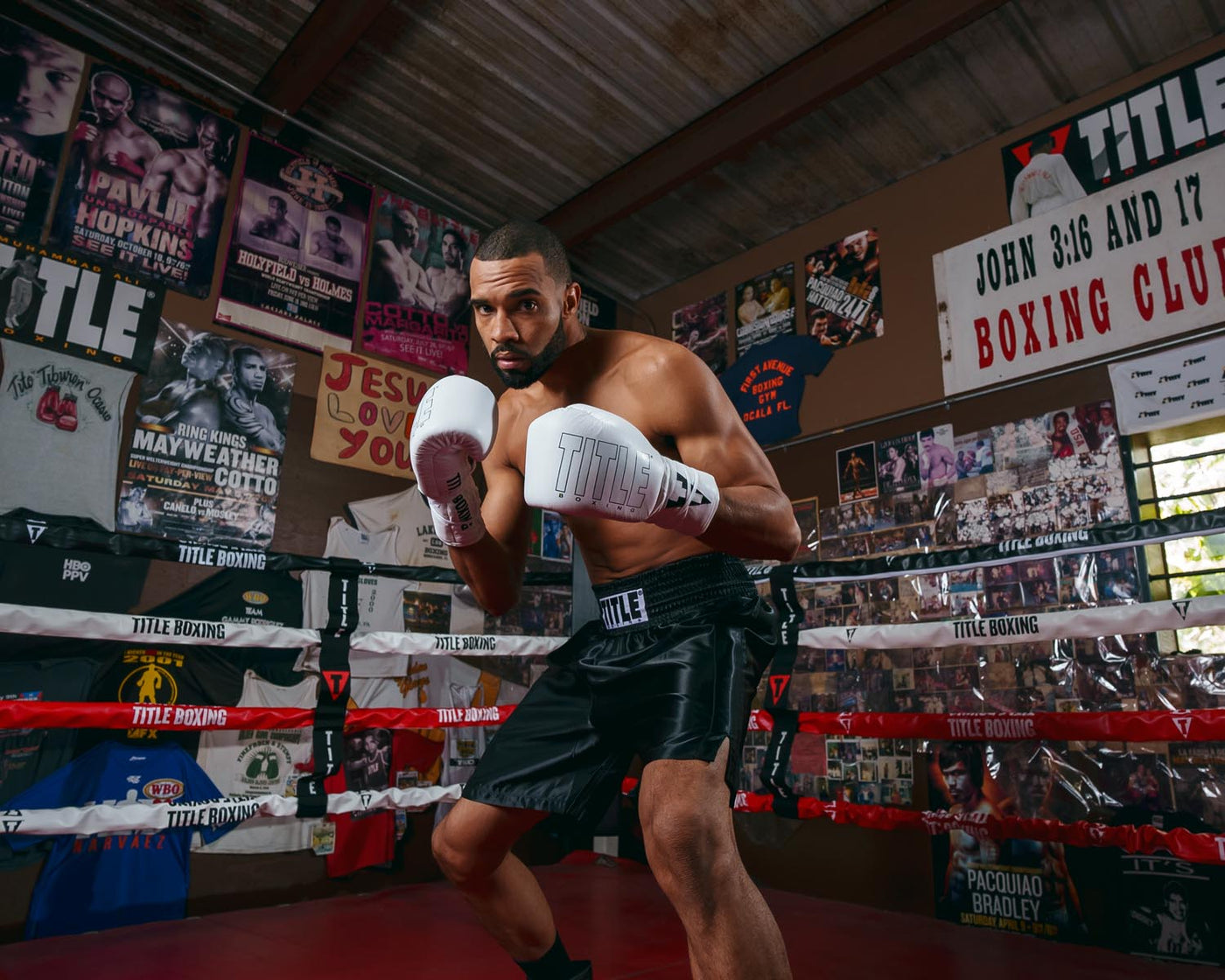 variant:black::TITLE Boxing Edge Boxing Trunks 2.0 guy in ring fight pose