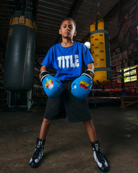 variant:Blue/White::TITLE Boxing Iconic Block Tee boy posing in tee