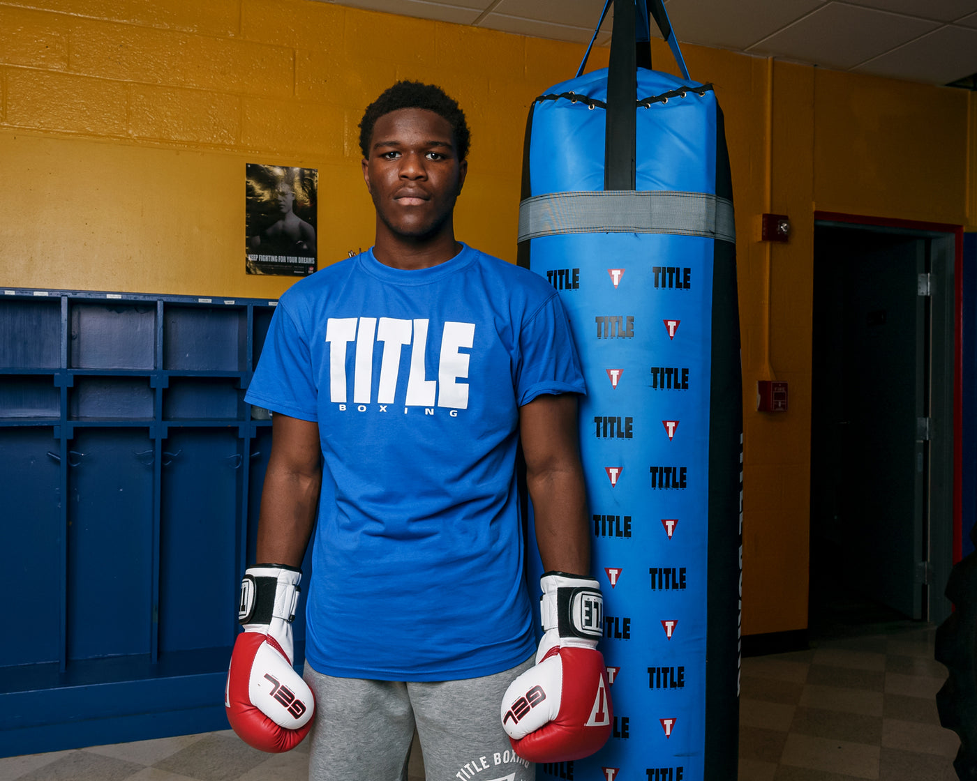 variant:Blue/White::TITLE Boxing Iconic Block Tee guy posing in tee