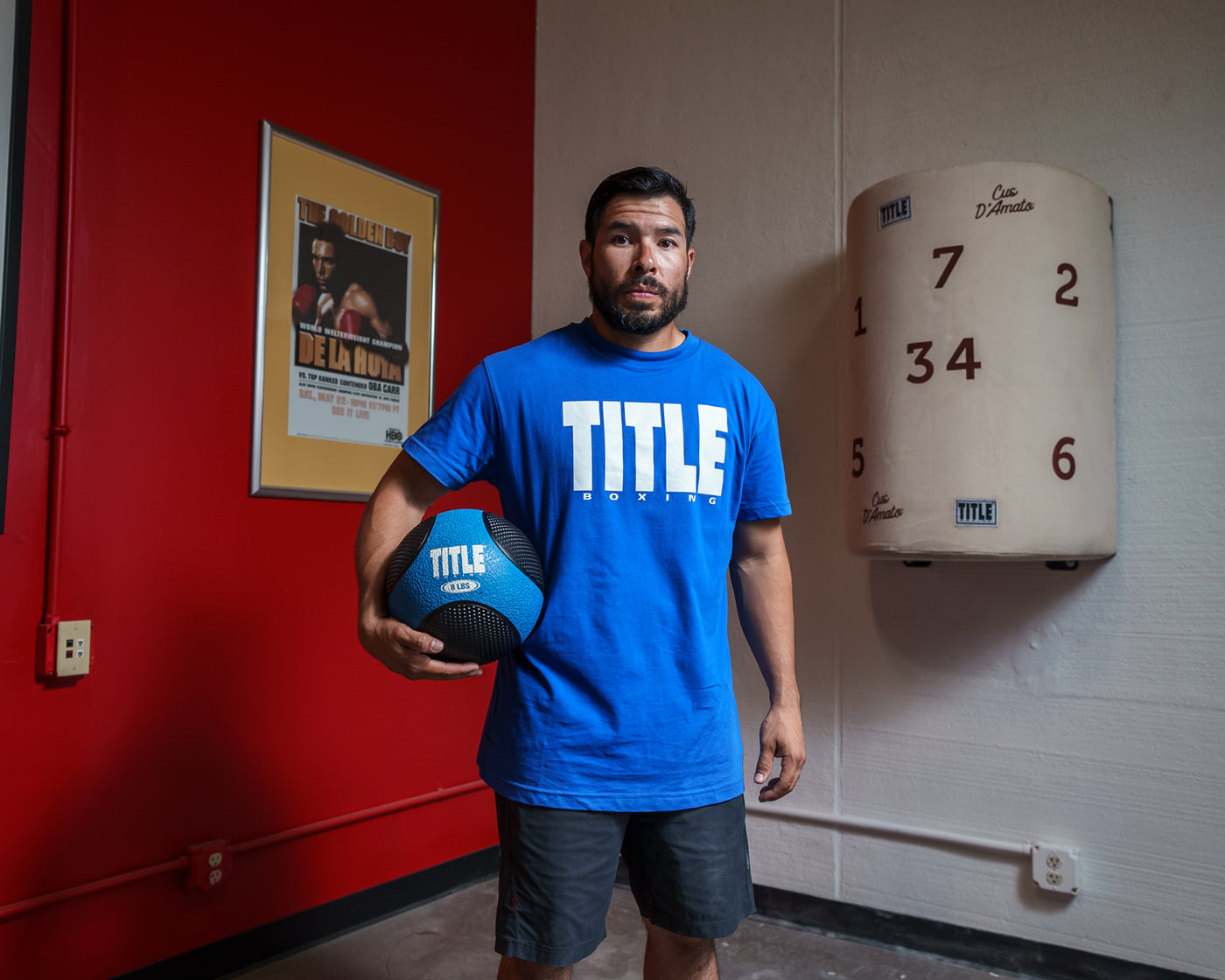 variant:Blue/White::TITLE Boxing Iconic Block Tee man posing in tee
