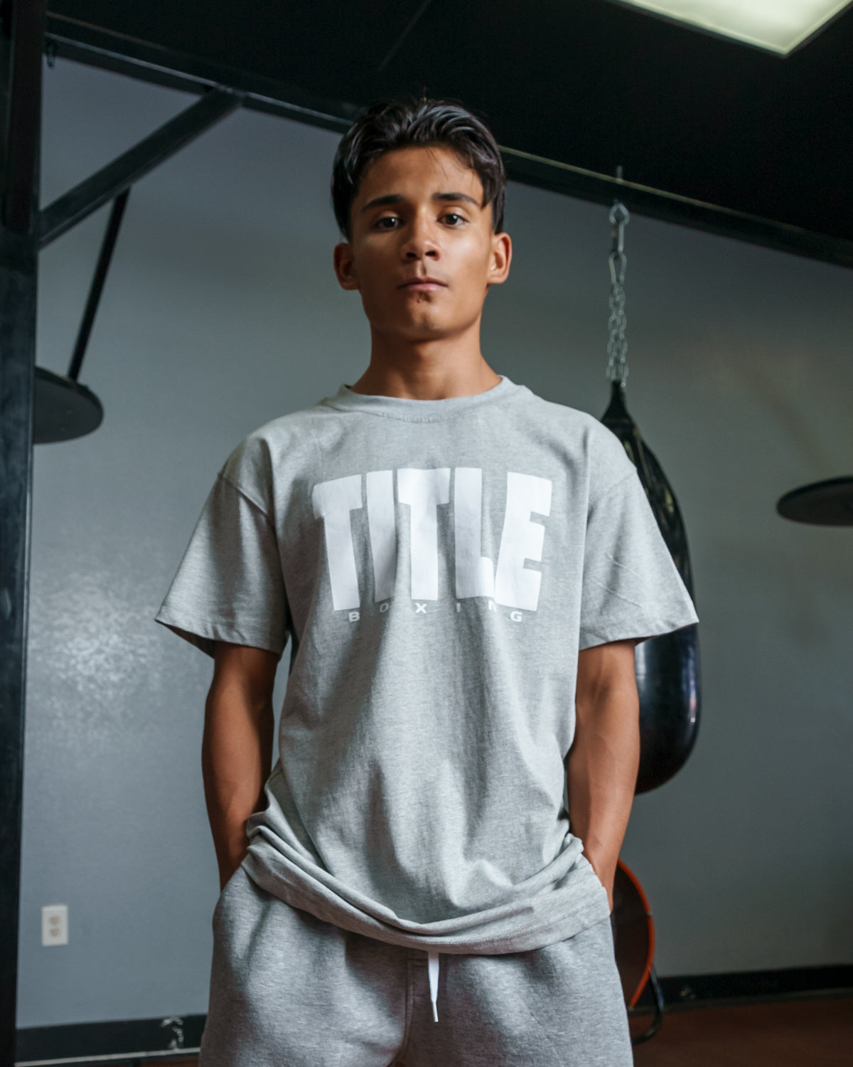 variant:Grey/White::TITLE Boxing Iconic Block Tee boy posing in tee