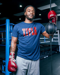 variant:Navy/Red::TITLE Boxing Iconic Block Tee man posing in tee