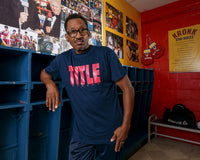 variant:Navy/Red::TITLE Boxing Iconic Block Tee man posing in tee