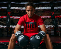 variant:Red/Black::TITLE Boxing Iconic Block Tee man posing in tee