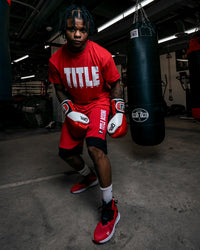 variant:Red/White::TITLE Boxing Iconic Block Tee man posing in tee