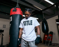 variant:White/Black::TITLE Boxing Iconic Block Tee man posing in tee