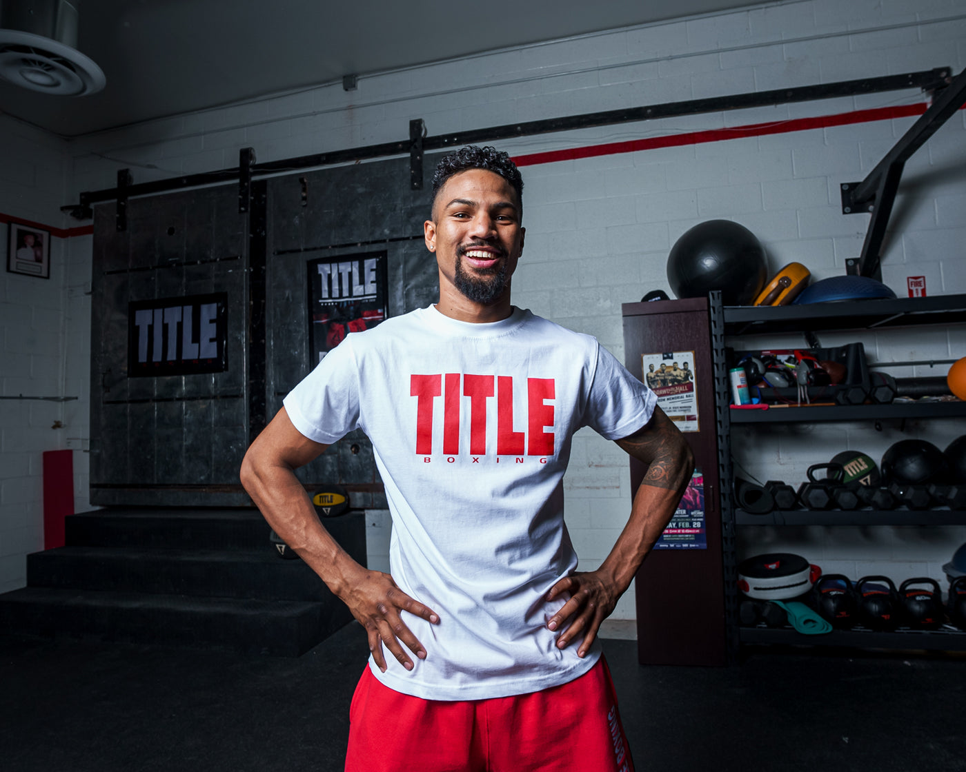 variant:White/Red::TITLE Boxing Iconic Block Tee man posing in tee